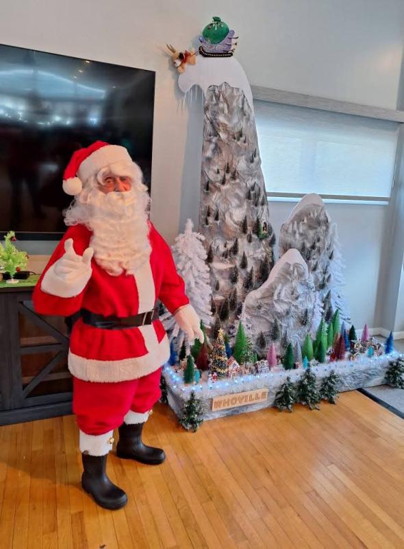 Adding to the party theme is this 9-foot-tall model of Mt. Crumpit, where the Grinch had planned to dump all his stolen Christmas loot from Whoville.